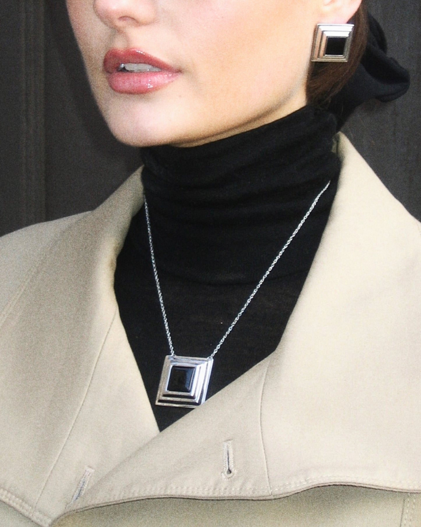 Black Panther necklace worn – modern silver pendant with black onyx, inspired by strength and quiet power.
