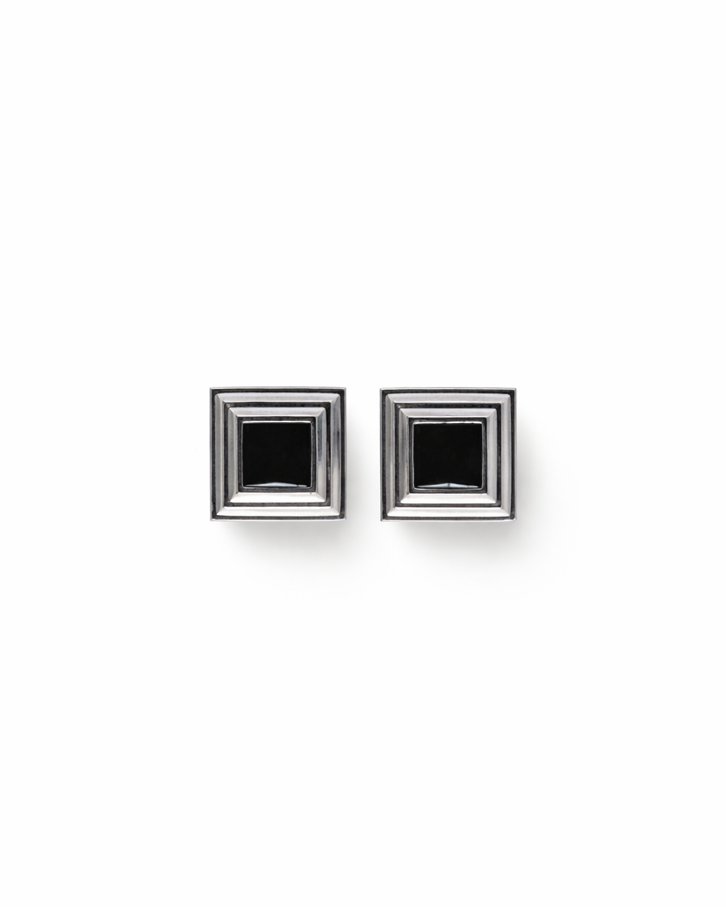 Cold Edges Black Panther silver earrings with a square black onyx stone, on a white background