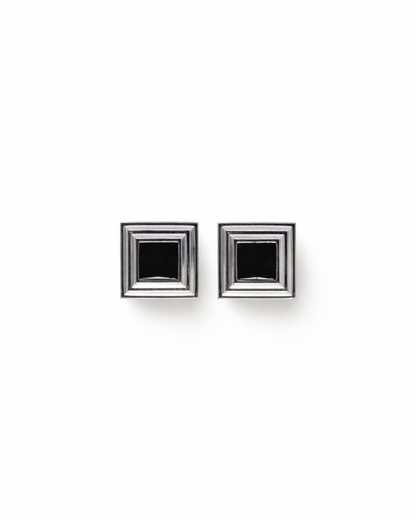 Cold Edges Black Panther silver earrings with a square black onyx stone, on a white background