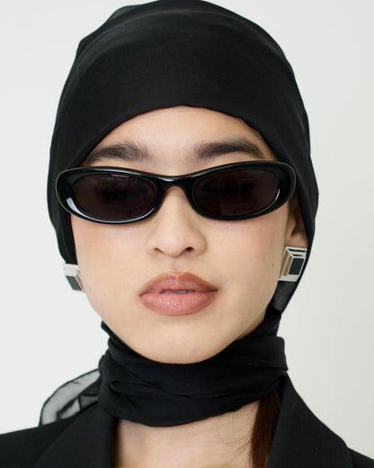 Black Panther earrings worn – modern silver earrings with a centered black onyx, striking and elegant.