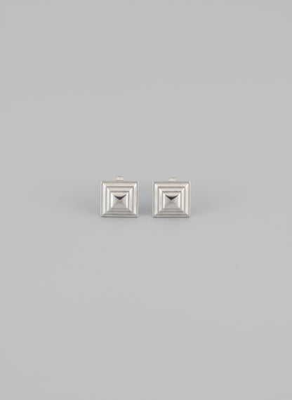 Small delicate statement earrings perfect for a Scandinavian look with a twist.